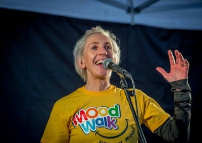 Dee McCahill warming-up the crowd at the Aware Mood Walk, L'Derry.